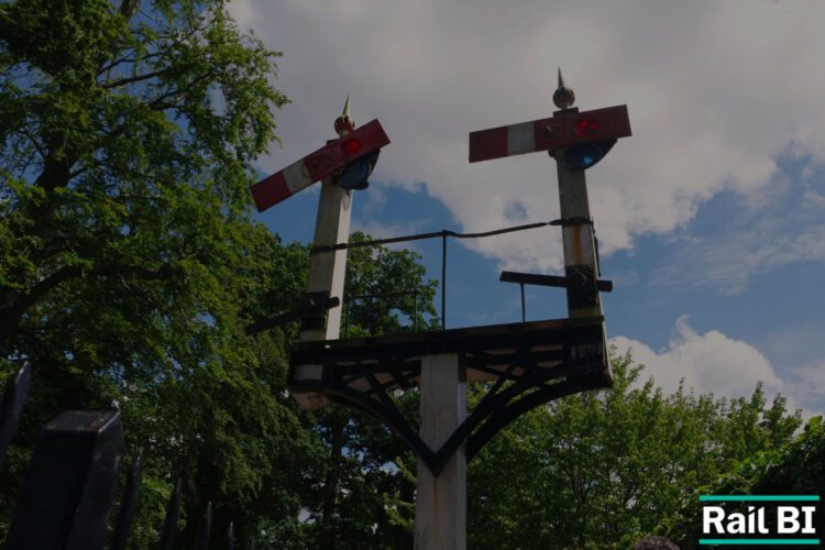 An image of rail signalling in the UK with Rail BI logo in the bottom right corner.